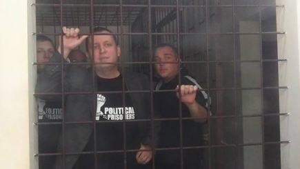 Семерым членам  