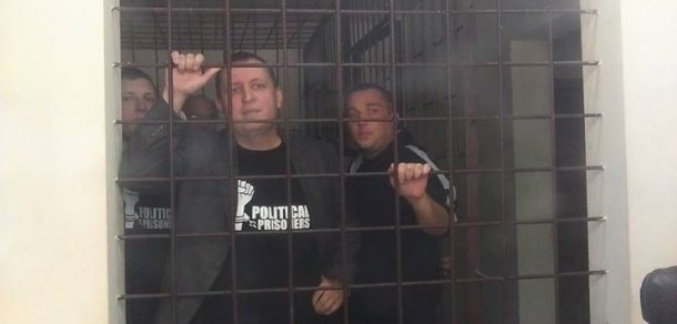 Семерым членам  